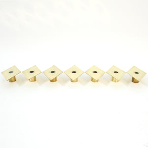 Sigurd Persson, set of 7 brass Romb candle holders, 1980s