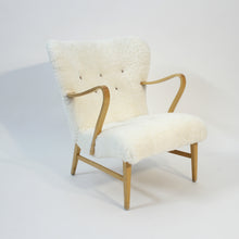 Load image into Gallery viewer, Swedish sheepskin lounge chair, attr. to Erik Bertil Karlén, 1940s