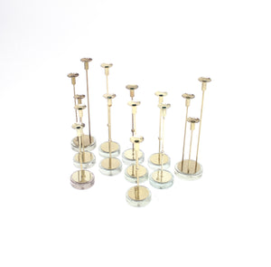 Gunnar Ander, set of 11 candle holders for Ystad Metall, 1960s