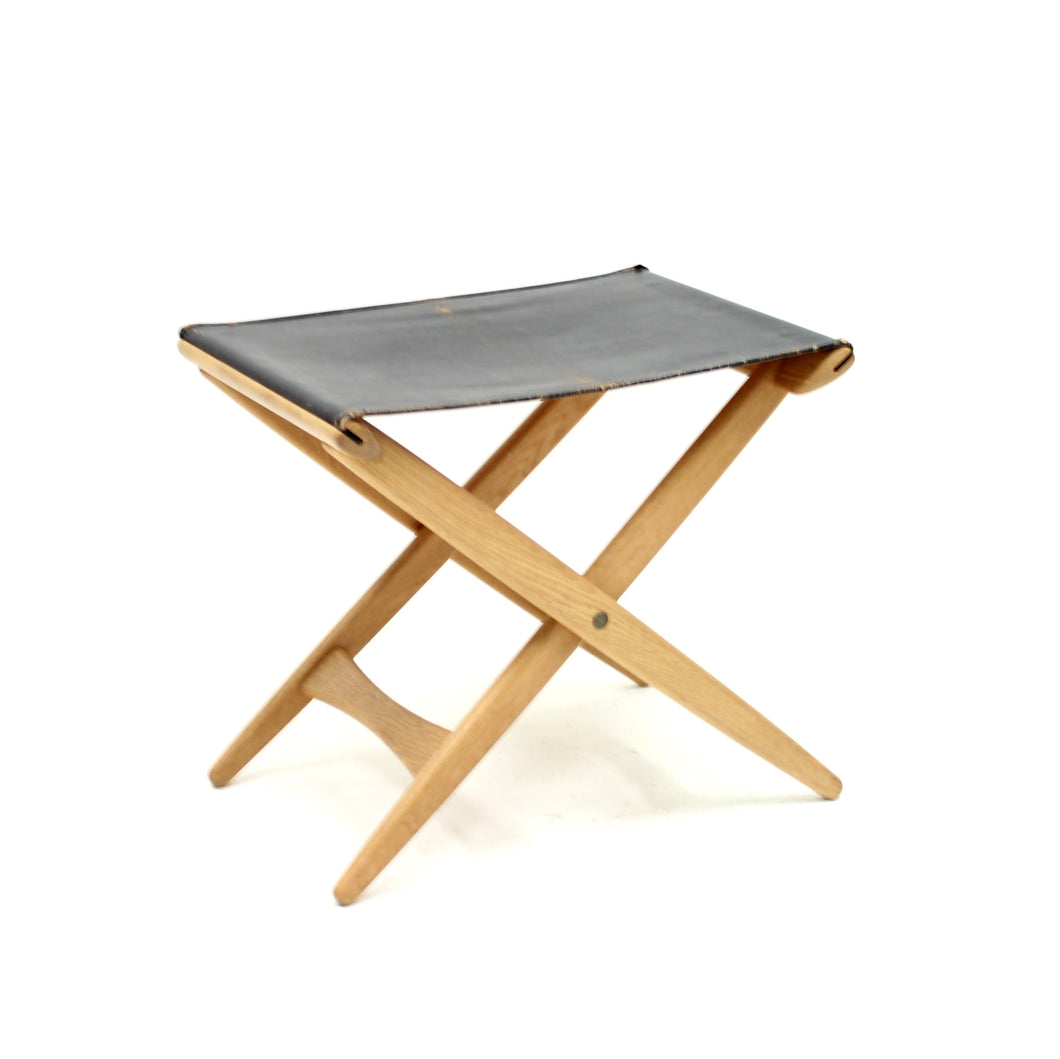 Oak and leather folding stool by Östen Kristiansson for Luxus, 1960s