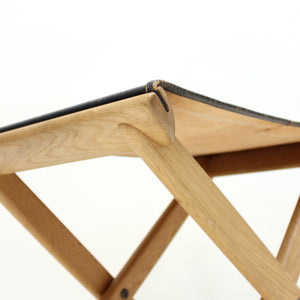 Oak and leather folding stool by Östen Kristiansson for Luxus, 1960s