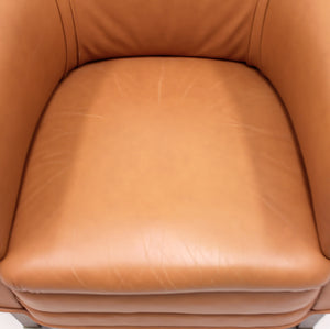 Brown leather club chair on castors, 1930s