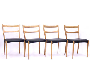 Scandinavian oak dining chairs with black leather seats, 1950s