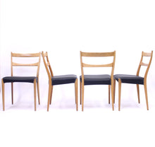 Load image into Gallery viewer, Scandinavian oak dining chairs with black leather seats, 1950s