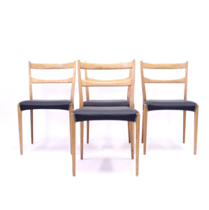 Scandinavian oak dining chairs with black leather seats, 1950s
