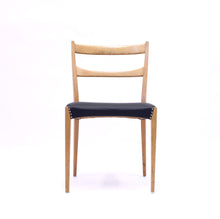Load image into Gallery viewer, Scandinavian oak dining chairs with black leather seats, 1950s