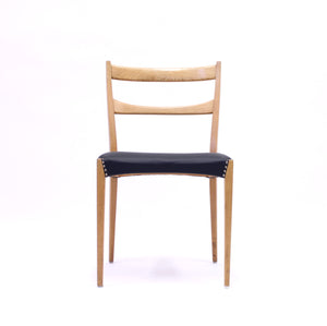 Scandinavian oak dining chairs with black leather seats, 1950s