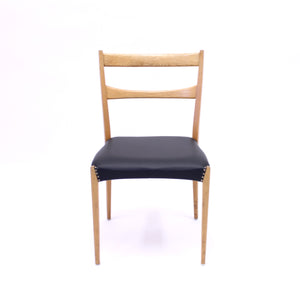 Scandinavian oak dining chairs with black leather seats, 1950s