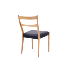 Load image into Gallery viewer, Scandinavian oak dining chairs with black leather seats, 1950s