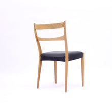 Load image into Gallery viewer, Scandinavian oak dining chairs with black leather seats, 1950s