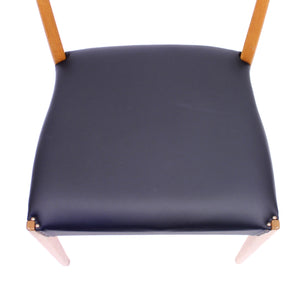 Scandinavian oak dining chairs with black leather seats, 1950s