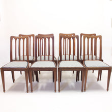 Load image into Gallery viewer, Set of 8 oak architectural Art Nouveau chairs, early 20th century