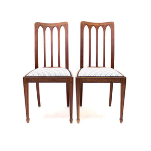 Set of 8 oak architectural Art Nouveau chairs, early 20th century