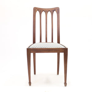 Set of 8 oak architectural Art Nouveau chairs, early 20th century