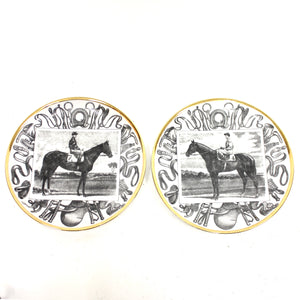 Pair of Fornasetti Grand Campioni plates, second half of 20th century