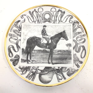 Pair of Fornasetti Grand Campioni plates, second half of 20th century