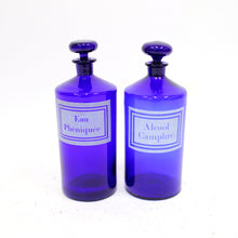 Load image into Gallery viewer, Pair of French cobalt blue apothecary bottles, early 20th century