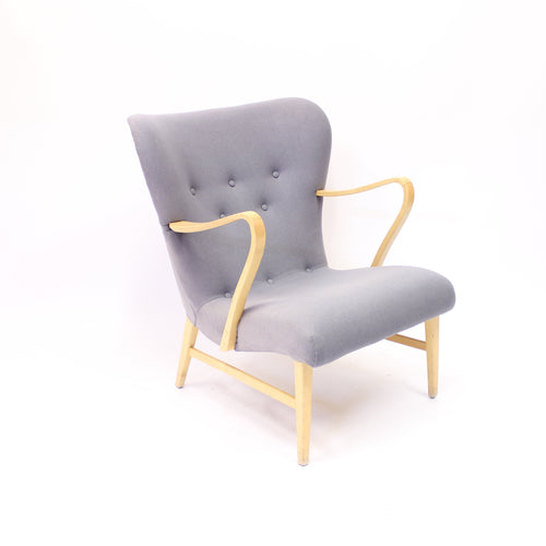 Swedish modern curved easy chair, 1940s