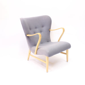 Swedish modern curved easy chair, 1940s