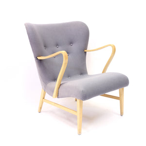 Swedish modern curved easy chair, 1940s
