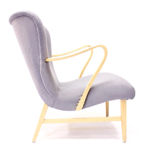 Swedish modern curved easy chair, 1940s