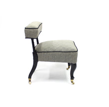 Load image into Gallery viewer, Diminutive antique ebonized reading chair on castors, late 19th century
